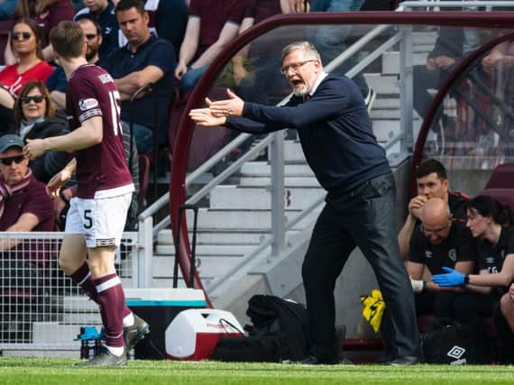Craig Levein barks instructions to his players. Picture: SNS