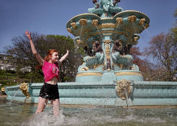 Zoe Beatson,11, cools off in the Ross Fountain in Edinburgh's Princes Street Gardens as Scotland continues to enjoy the warm Easter weather. Picture: Jane Barlow/PA Wire