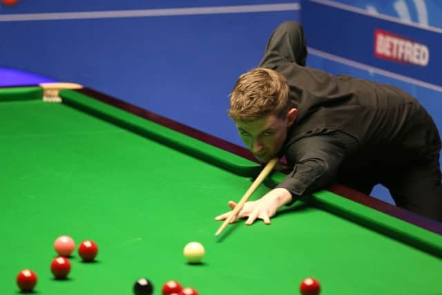 Amateur James Cahill leads World No 1 Ronnie OSullivan 5-4 at the halfway point of their first-round match at the Crucible. Picture: PA.