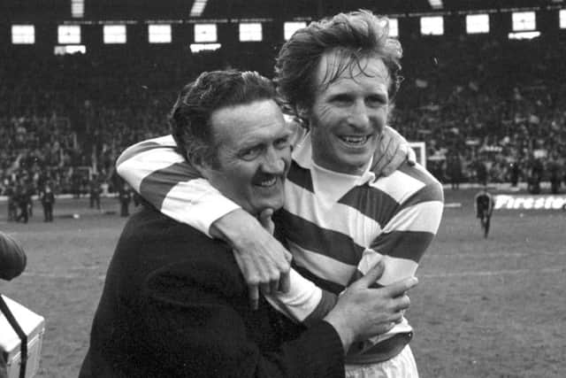 Manager Jock Stein celebrates with McNeill after Celtic beat Dundee United 3-0 in the Scottish Cup final, May 1974.