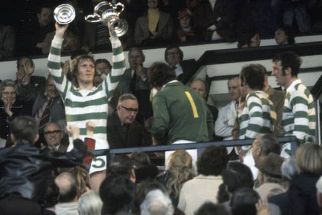 Captain Billy McNeill lifts the Scottish Cup in 1975 after his last match for Celtic. Picture: SNS