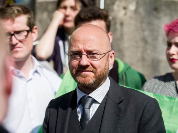 Patrick Harvie has been accused of misogyny for sharing a blog which described a female MSP as a "w*****".
