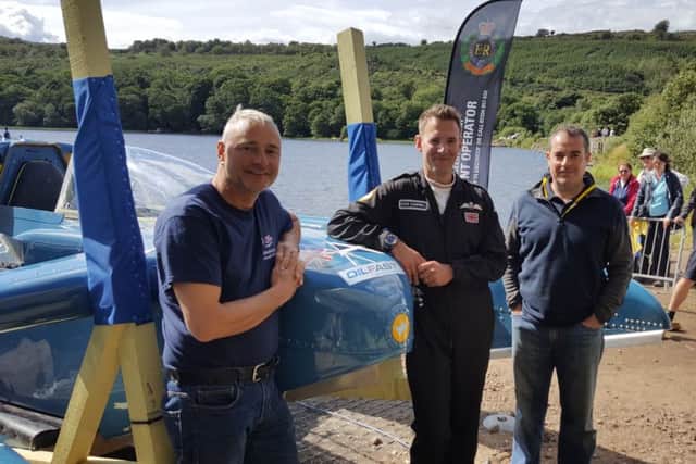 At the relaunch of the Bluebird K7 are (l-r) hydroplane expert Ted Walsh, ex-Red Arrows pilot Stew Campbell and Oilfast's Joe Carroll