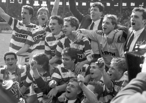 The Celtic players, with Peter Grant centre bottom of the picture, celebrate their 1988 Scottish Cup win. Picture: Brian Stewart