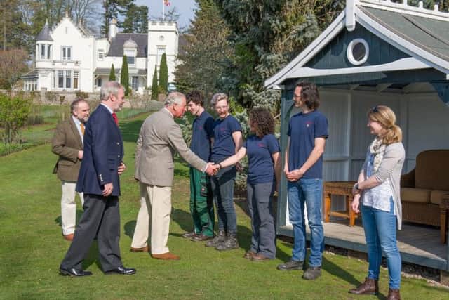 The Prince chats to the estate's horticultural trainees