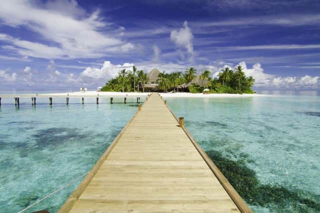 The jetty approach to Mirihi Island, one of the smallest of the 1,190 islands in the Maldives