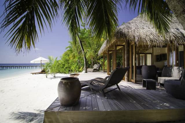 The centre of Mirihi Island is surrounded by white, powdery sand