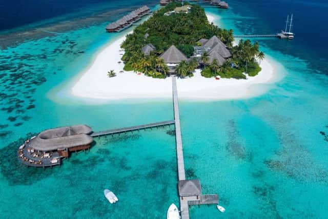 Arriving by seaplane gives you an aerial view of the island