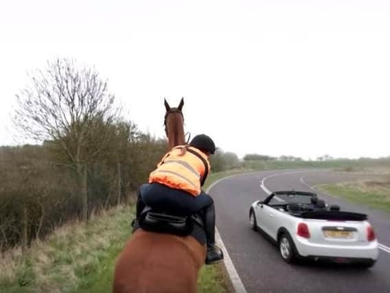 Drivers are urged to slow to 15mph passing horses. Picture: British Horse Society