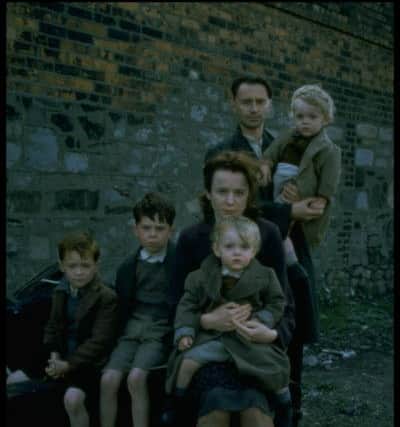 Playing Angela McCourt, with Robert Carlyle as Malachy in  Angela's Ashes, 1999
