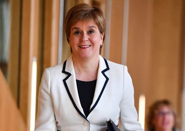 Nicola Sturgeon heads to the Scottish Parliament's debating chamber to update MSPs on Brexit and independence (Picture: Jeff J Mitchell/Getty Images)