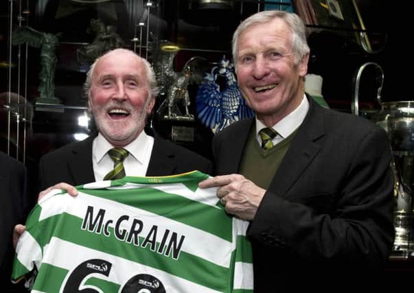 The late, great Billy McNeill pictured presenting Danny McGrain with a Celtic shirt to mark his 60th birthday in 2010. Picture: SNS