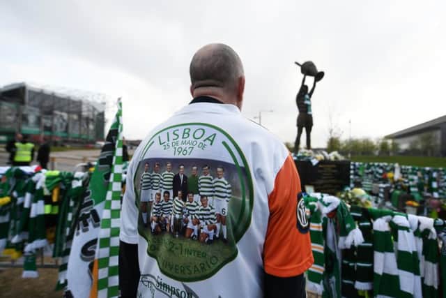 A fan pays tribute to Billy McNeill outside Celtic Park. Picture: John Devlin