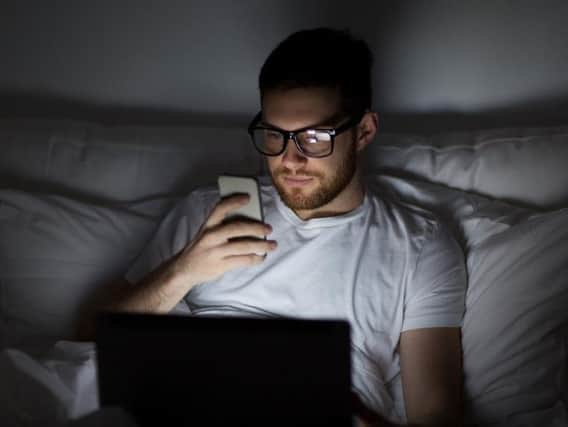 The blue light emitted from your devices will stop you from getting a good night's sleep (Photo: Shutterstock)