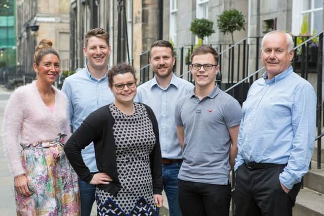 The Saltire team at their new Edinburgh office. From left: Victoria Mungall, Harris Grant, Suzanne MacKintosh, Bryan Leslie, Duncan Martin and Alan Esson. Picture: Nick Mailer