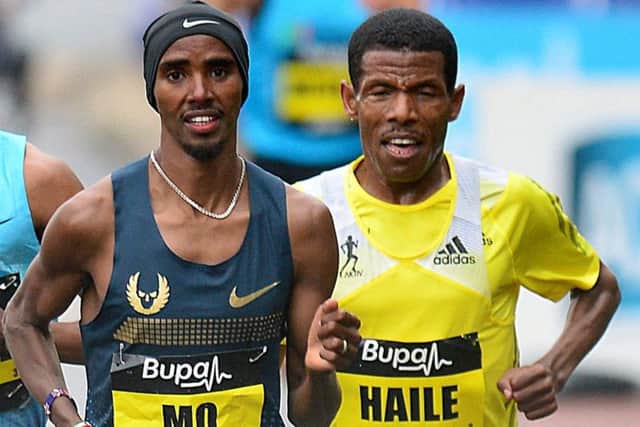 The long-distance legends, now engaged in a war of words, compete against each other in 2013. Picture: Owen Humphreys/PA
