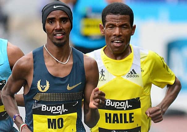 The long-distance legends, now engaged in a war of words, compete against each other in 2013. Picture: Owen Humphreys/PA