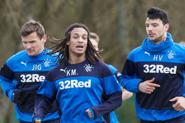 Kevin Mbabu (centre) at a Rangers training session alongside Lee McCulloch (left) and Haris Vuckic. Picture: SNS Group
