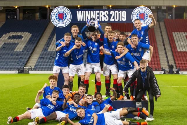 The Rangers U18 players celebrate their win in the Scottish Youth Cup Final at Hampden Park. Picture: Bruce White/SNS
