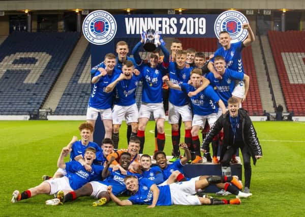 The Rangers U18 players celebrate their win in the Scottish Youth Cup Final at Hampden Park. Picture: Bruce White/SNS