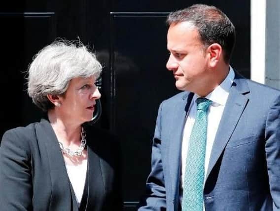 Theresa May and Irish Prime Minister Leo Varadkar released a joint statement announcing new talks with Northern Irish parties