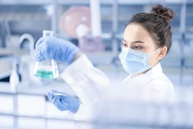 Young female scientist working in the laboratory
