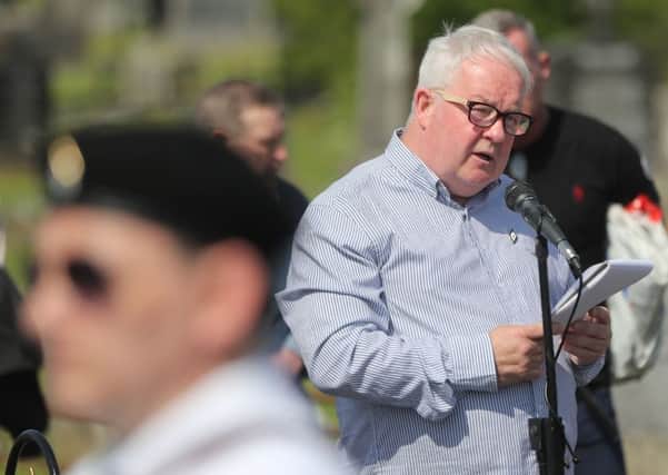 Saoradh Chairman Brian Kenna speaking during their Easter commemoration at Milltown Cemetery in Belfast. Niall Carson/PA Wire