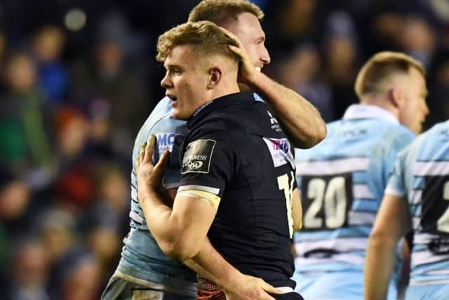 Glasgow's Stuart Hogg and Edinburgh's Darcy Graham embrace after Edinburgh's Murrayfield win in December. Picture: SNS