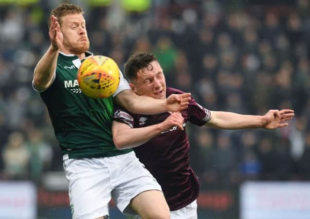 Hearts' Bobby Burns battles with Daryl Horgan of Hibs at Tynecastle. Picture: Craig Foy/SNS