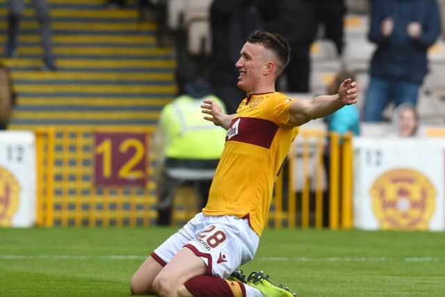 Motherwell's David Turnbull celebrates his opener. Pic: SNS/Craig Foy