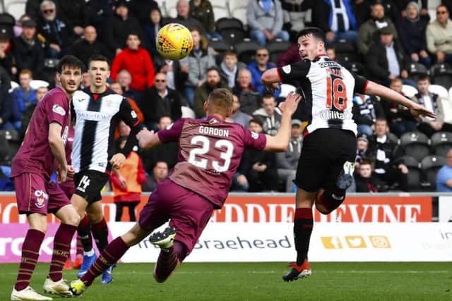 St Mirren's Danny Mullen has a shot on goal. Pic: SNS/Rob Casey