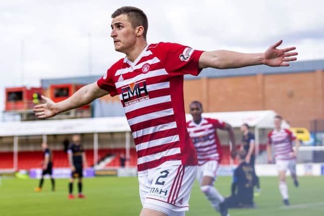 Hamilton's Aaron McGowan celebrates leveling the scoring for his side late on. Pic: SNS/Roddy Scott