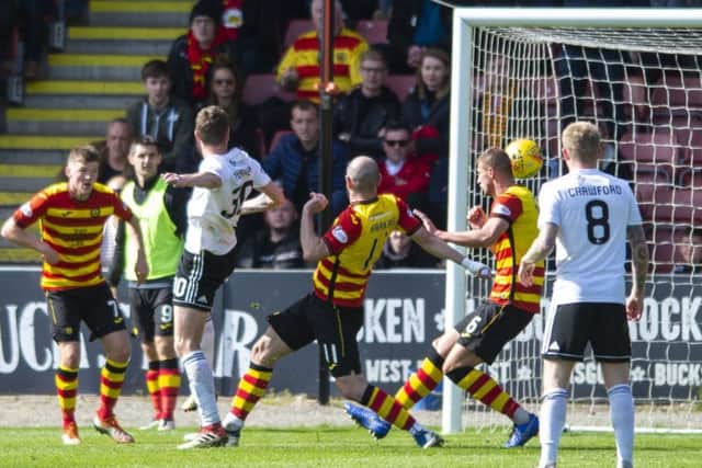Ayr's Aaron Muirhead puts his side ahead. Pic: SNS/Sammy Turner