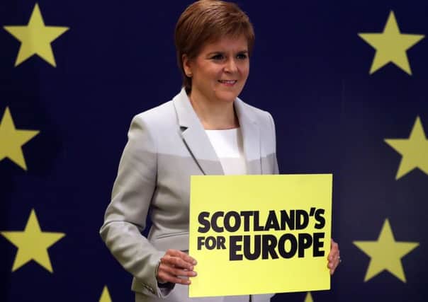 First Minister Nicola Sturgeon in front of a European flag at the SNP European Elections Campaign Conference being held at EICC in Edinburgh. Picture: Andrew Milligan/PA Wire