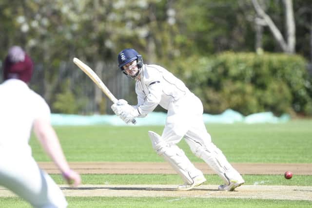 Johann Potgieter helps Heriots compile a total that was modest but beyond the reach of visitors Watsonians in a rain-affected match. Picture: Greg Macvean.