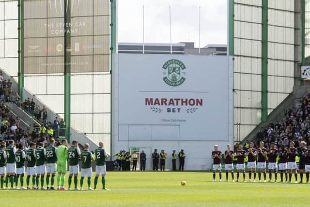 A minute's applause in memory of Billy McNeill is staged at Easter Road ahead of the Edinburgh derby. Picture: SNS Group