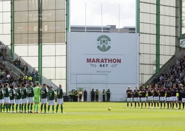 A minute's applause in memory of Billy McNeill is staged at Easter Road ahead of the Edinburgh derby. Picture: SNS Group