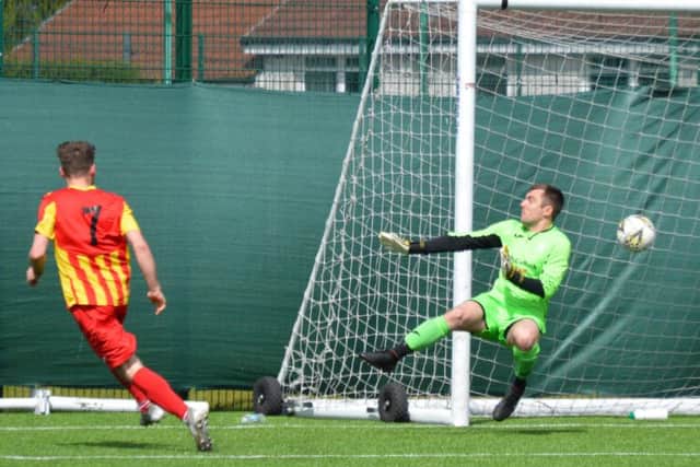 Chris Duff scores Rossvale's first against Girvan (pic by HT Photography/@dibsy_)