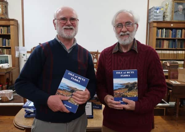 Patrick O'Sullivan (left) President of Bute Museum  and the author of Isle of Bute Flora Angus Hannah (right), pictured at the book launch.