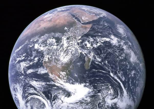 Images of the Earth from space are credited with boosting awareness of environmental concerns (Picture: Nasa via AP)