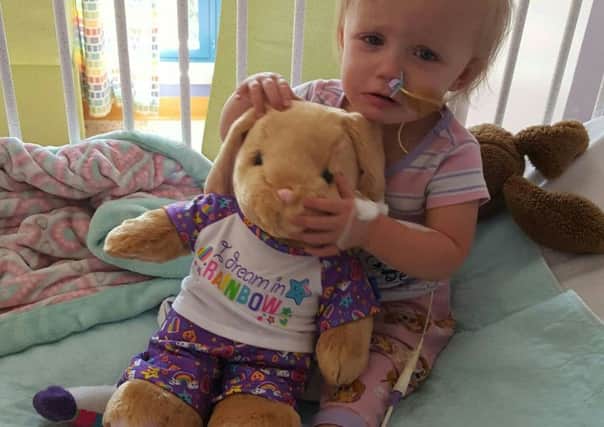 Abigayle Galle, two, is lucky to be alive after she ingested the battery. Picture: SWNS