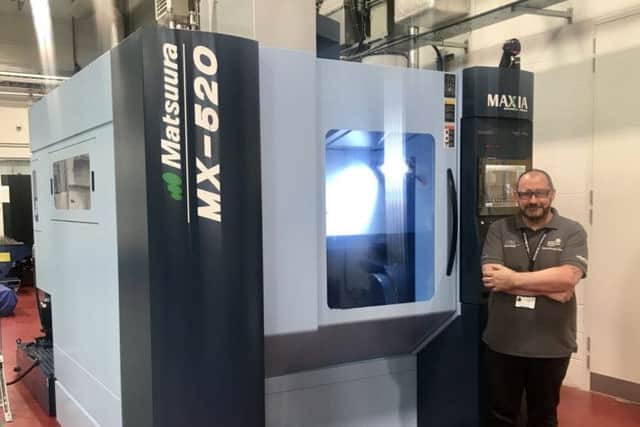 Engineer Crawford Cullen with the Matsuura machine. Picture: Contributed