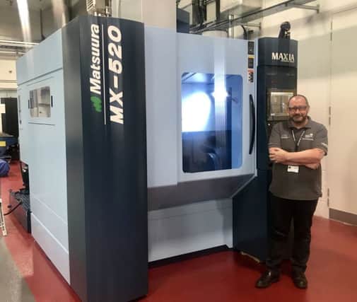 Engineer Crawford Cullen with the Matsuura machine. Picture: Contributed