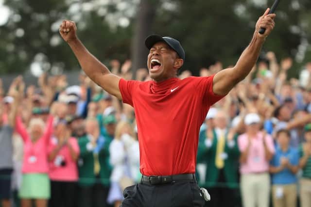 Tiger Woods roars with joy after ending an 11-year drought in majors as he won The Masters last month. Picture: Andrew Redington/Getty