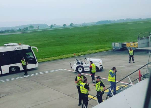 Police prepare to search the EasyJet aircraft. Picture: @kmcca5/PA Wire