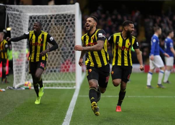 Andre Gray (centre) celebrates a goal for Watford. Picture: Getty Images