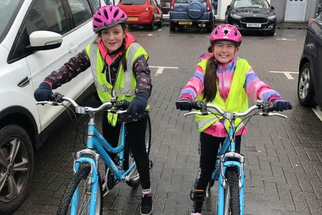 Back in Rothesay at the end of their charity cycle, Mariska Silkowski (black jacket) and  Emma McDade.