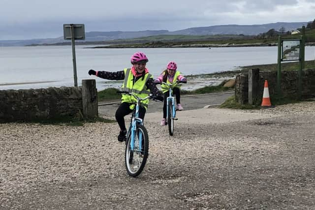 Mariska Silkowski (black jacket) and  Emma McDade at Ettrick Bay.