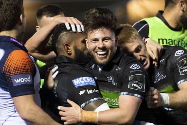 Glasgow scrum-half Ali Price, centre, celebrates a try for his side during the 34-10 victory over Edinburgh at Scotstoun last weekend. Picture: SNS/SRU