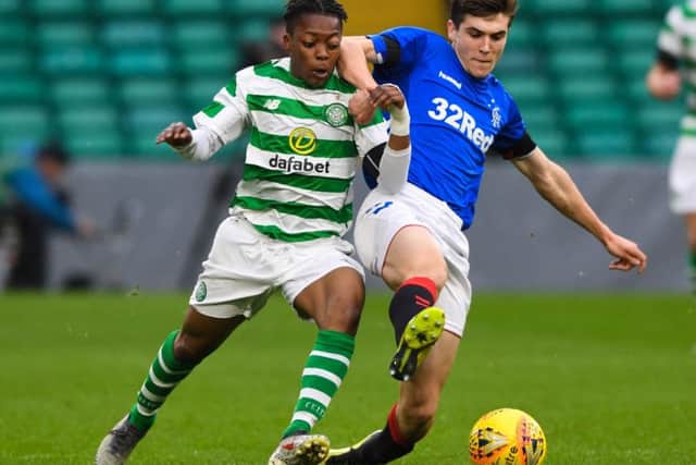 Celtic's Karamoko Dembele vies with Jamie Barjonas of Rangers in the City of Glasgow Cup final. Picture: Craig Foy/SNS